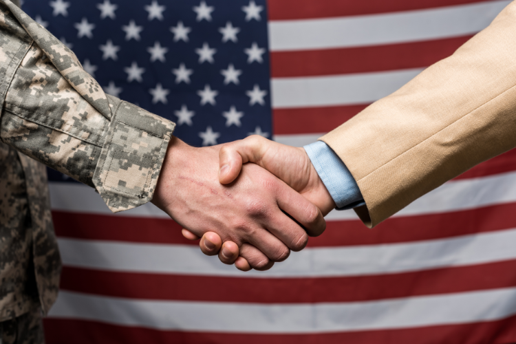 selective focus military men shaking hands near am 2023 11 27 05 32 01 utc